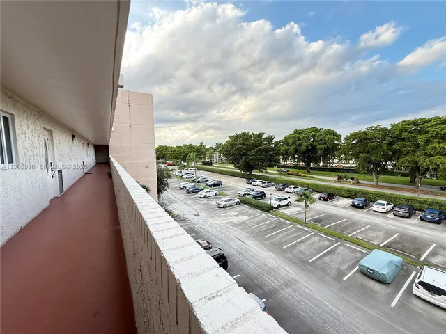 a view of roof deck with patio