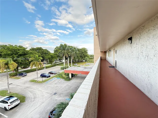 a view of swimming pool with seating area