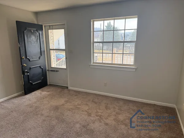 an empty room with windows
