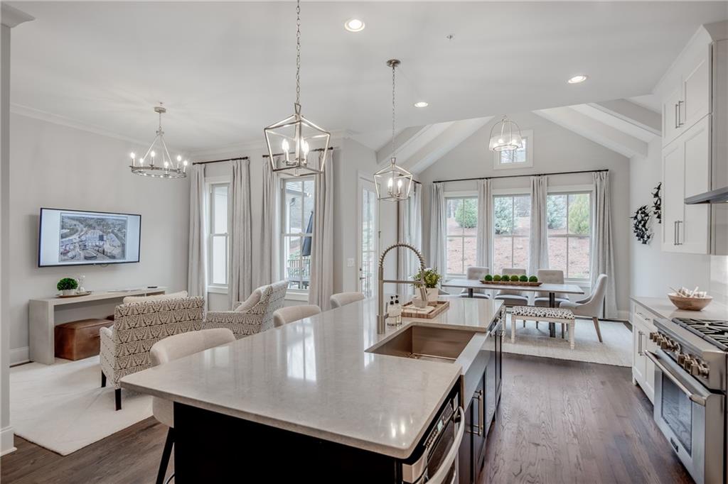 3440 Commander Cove Suwanee, GA 30024 - Photo 21 of 59 a large kitchen with a table and chairs