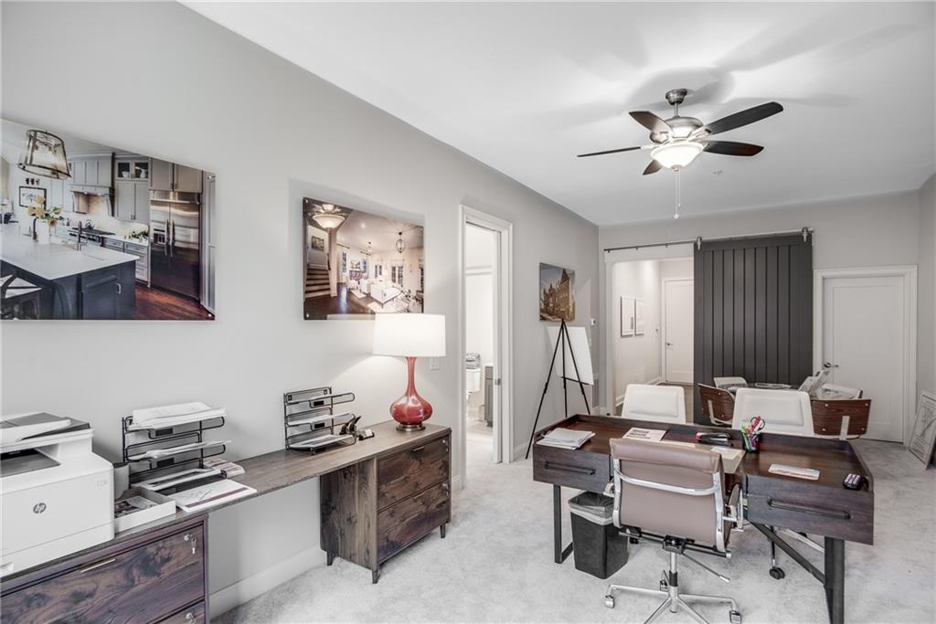 3440 Commander Cove Suwanee, GA 30024 - Photo 48 of 59 a view of a workspace with furniture