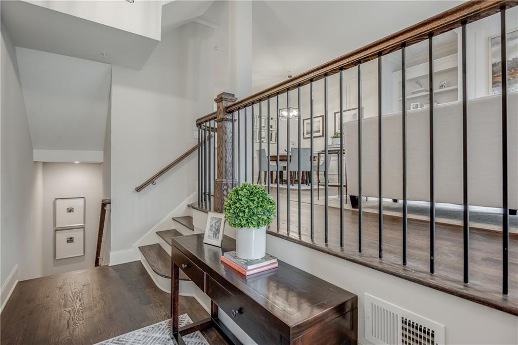 3440 Commander Cove Suwanee, GA 30024 - Photo 9 of 59 a view of a hallway with furniture and stairs