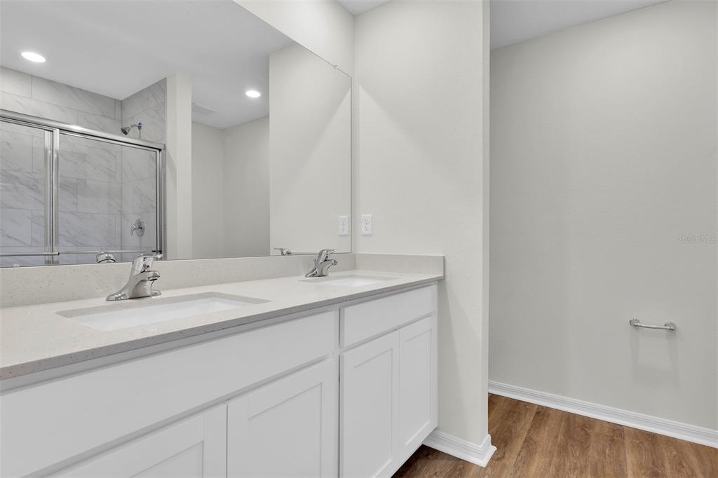 13392 Southwest 77th Avenue Ocala, FL 34473 - Photo 10 of 15 a bathroom with a sink and a mirror