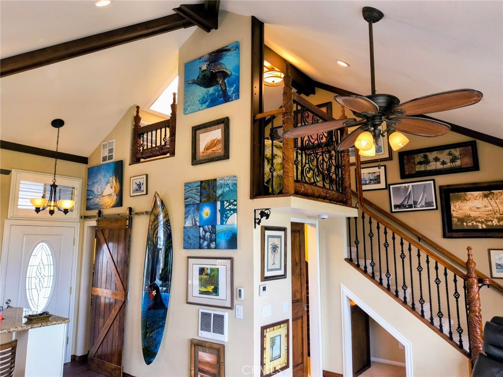 20331 Bluffside Circle, Unit A411 Huntington Beach, CA 92646 - Photo 12 of 44 a view of a livingroom with furniture and staircase
