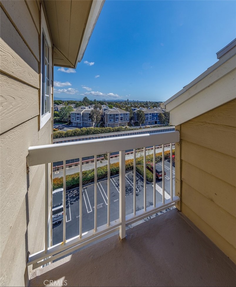 20331 Bluffside Circle, Unit A411 Huntington Beach, CA 92646 - Photo 16 of 44 End unit balcony view.