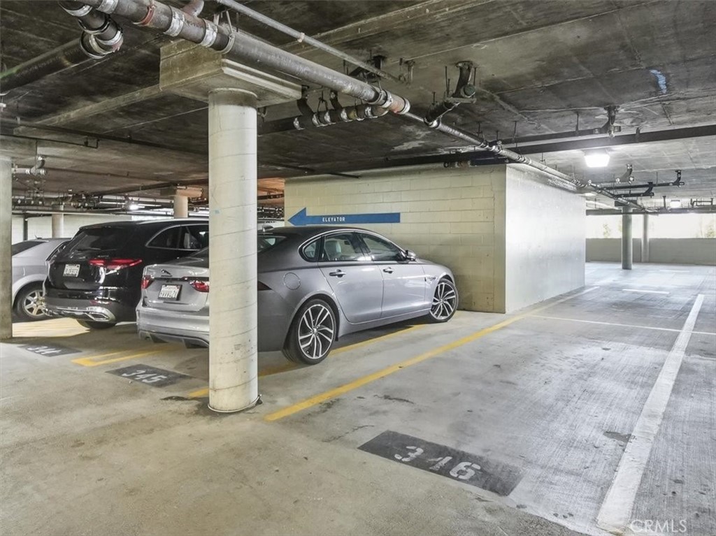 20331 Bluffside Circle, Unit A411 Huntington Beach, CA 92646 - Photo 29 of 44 a view of a garage