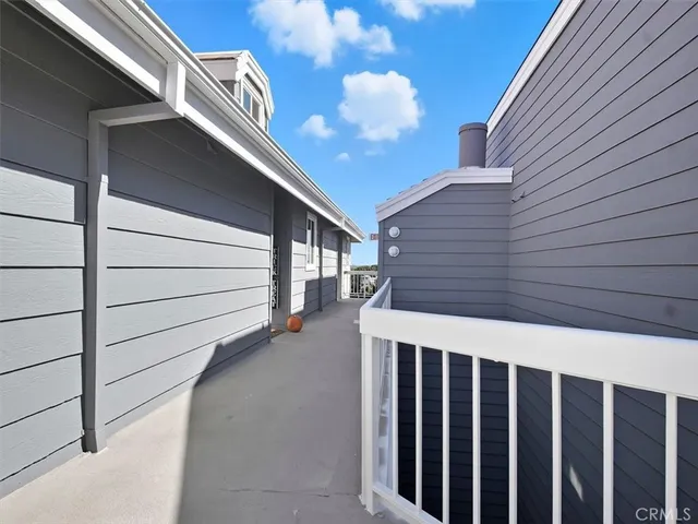 a view of a chairs and table in backyard