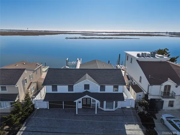 an aerial view of a house having patio