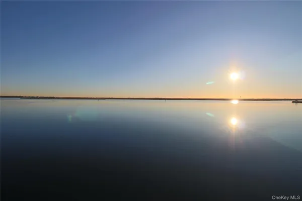 a view of a lake from a room