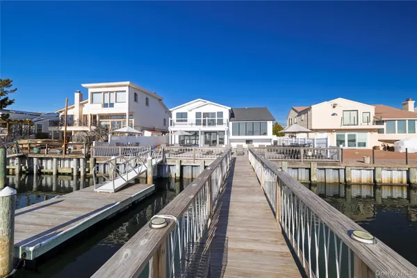 a view of a balcony with furniture