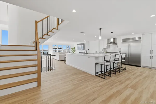 a view of a kitchen and dining room