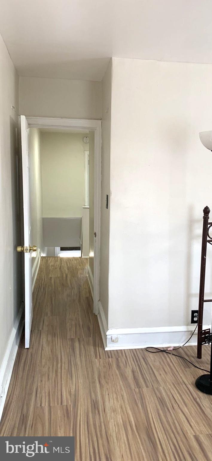 252 Rosemar Street, Unit 2 Philadelphia, PA 19120 - Photo 17 of 22 a view of empty room with wooden floor