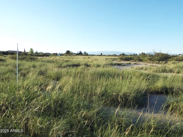 a view of lake with green space