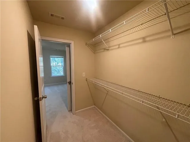 a bathroom with a tub and shower