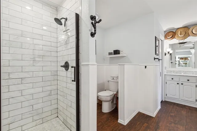 a view of a house with swimming pool and sitting area