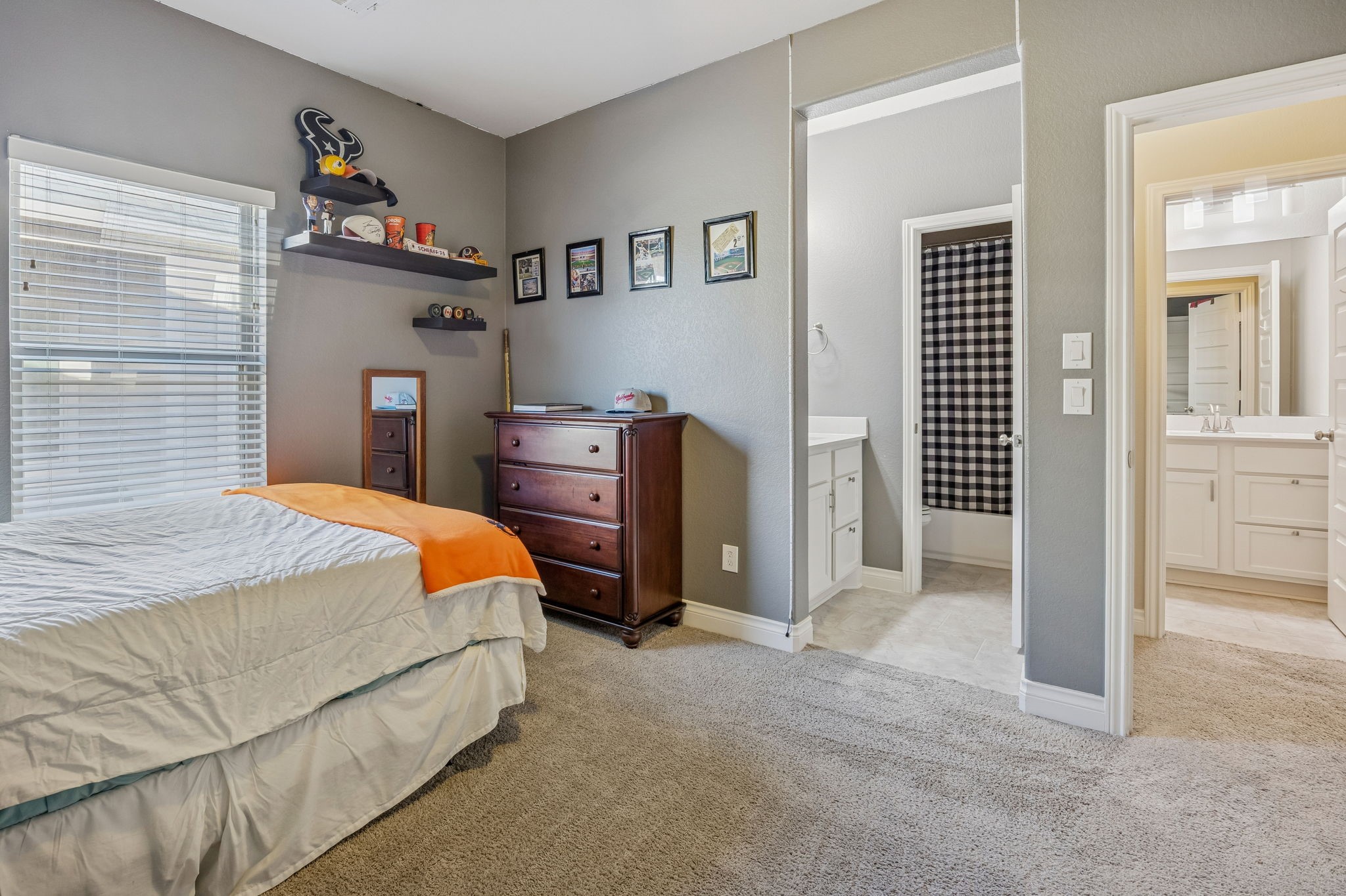 28706 Casen Ranch Lane Fulshear, TX 77441 - Photo 20 of 31 The fourth bedroom offers a generous and inviting space that is perfect if you're looking for comfort and versatility.