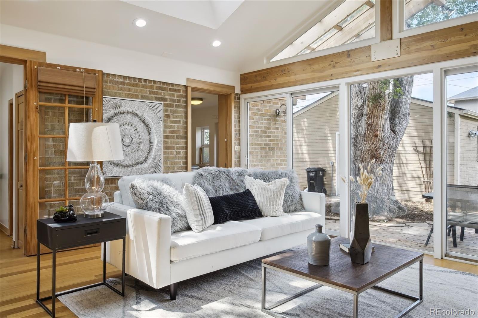 2675 Raleigh Street Denver, CO 80212 - Photo 11 of 33 a living room with furniture and a large window