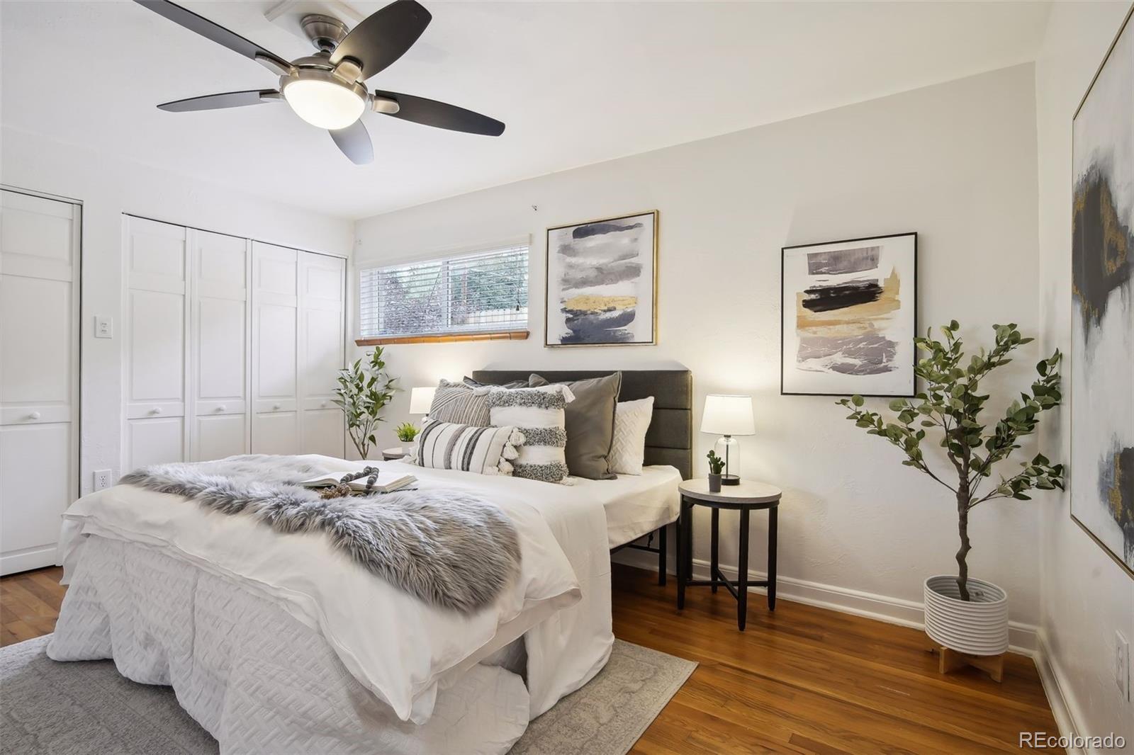 2675 Raleigh Street Denver, CO 80212 - Photo 17 of 33 a bedroom with a bed table and a lamp