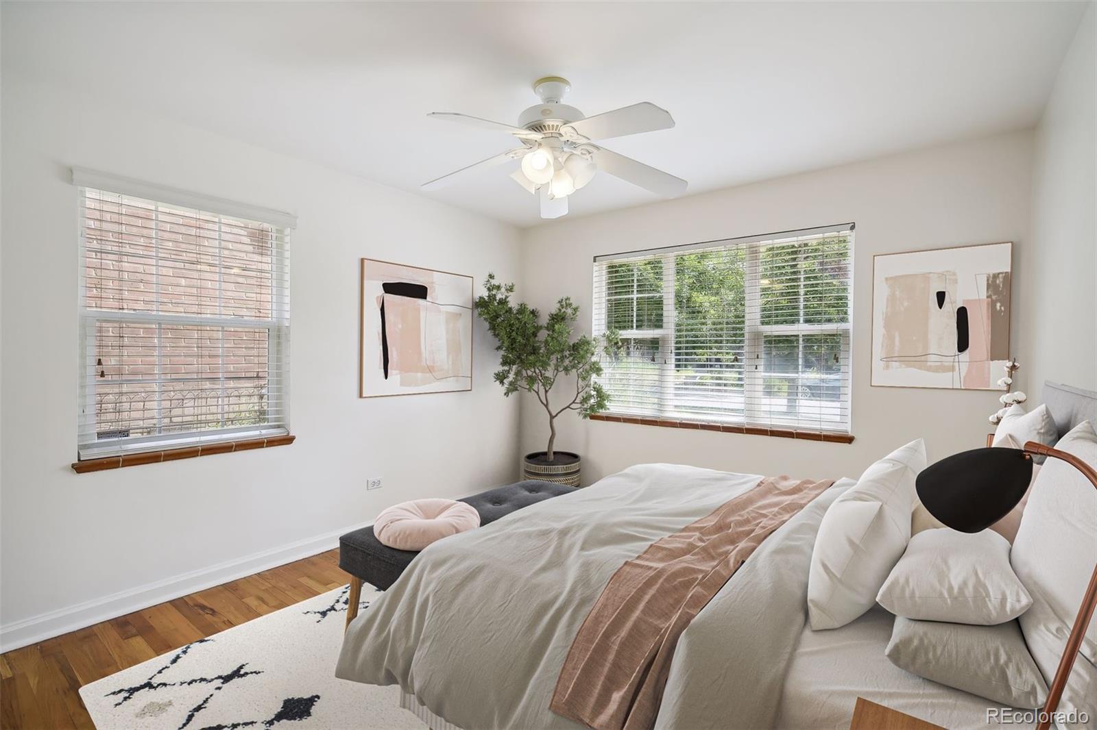 2675 Raleigh Street Denver, CO 80212 - Photo 22 of 33 a bedroom with a bed and a large window