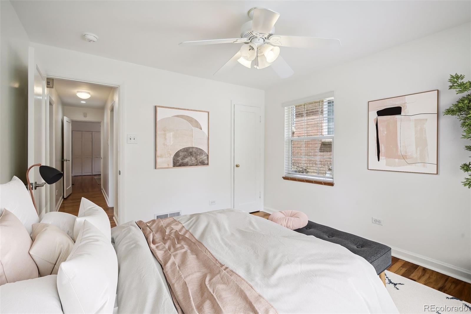2675 Raleigh Street Denver, CO 80212 - Photo 23 of 33 a bedroom with a large bed couch and window