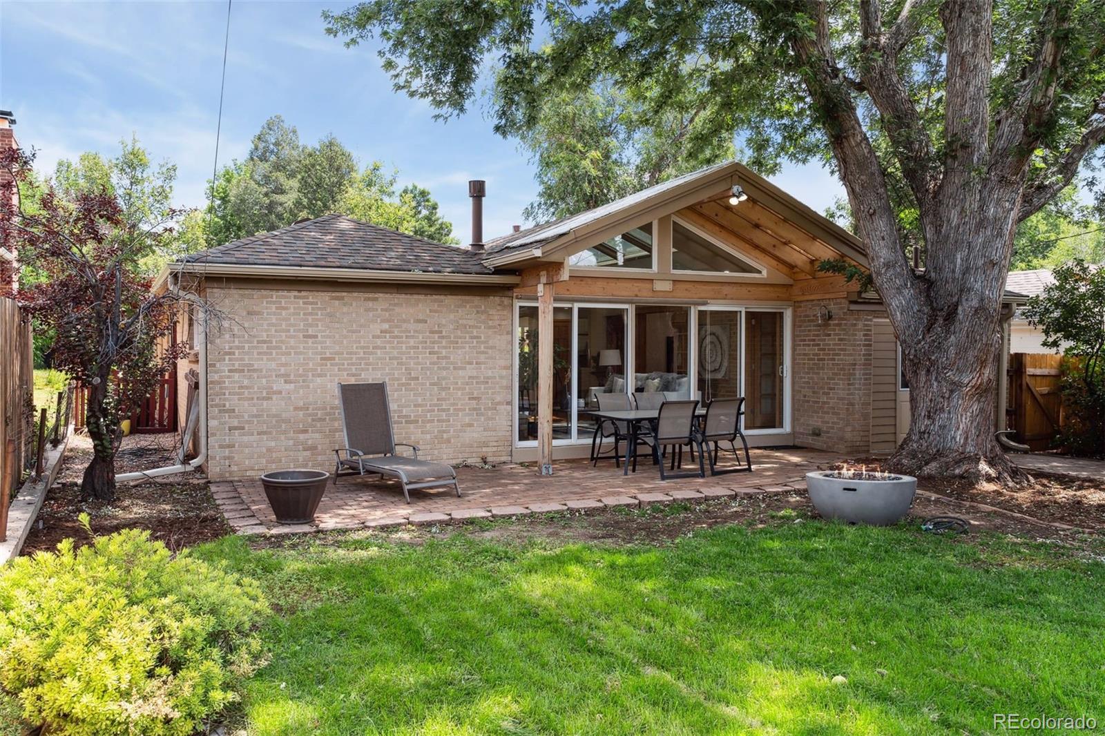 2675 Raleigh Street Denver, CO 80212 - Photo 27 of 33 a view of a house with backyard sitting area and garden