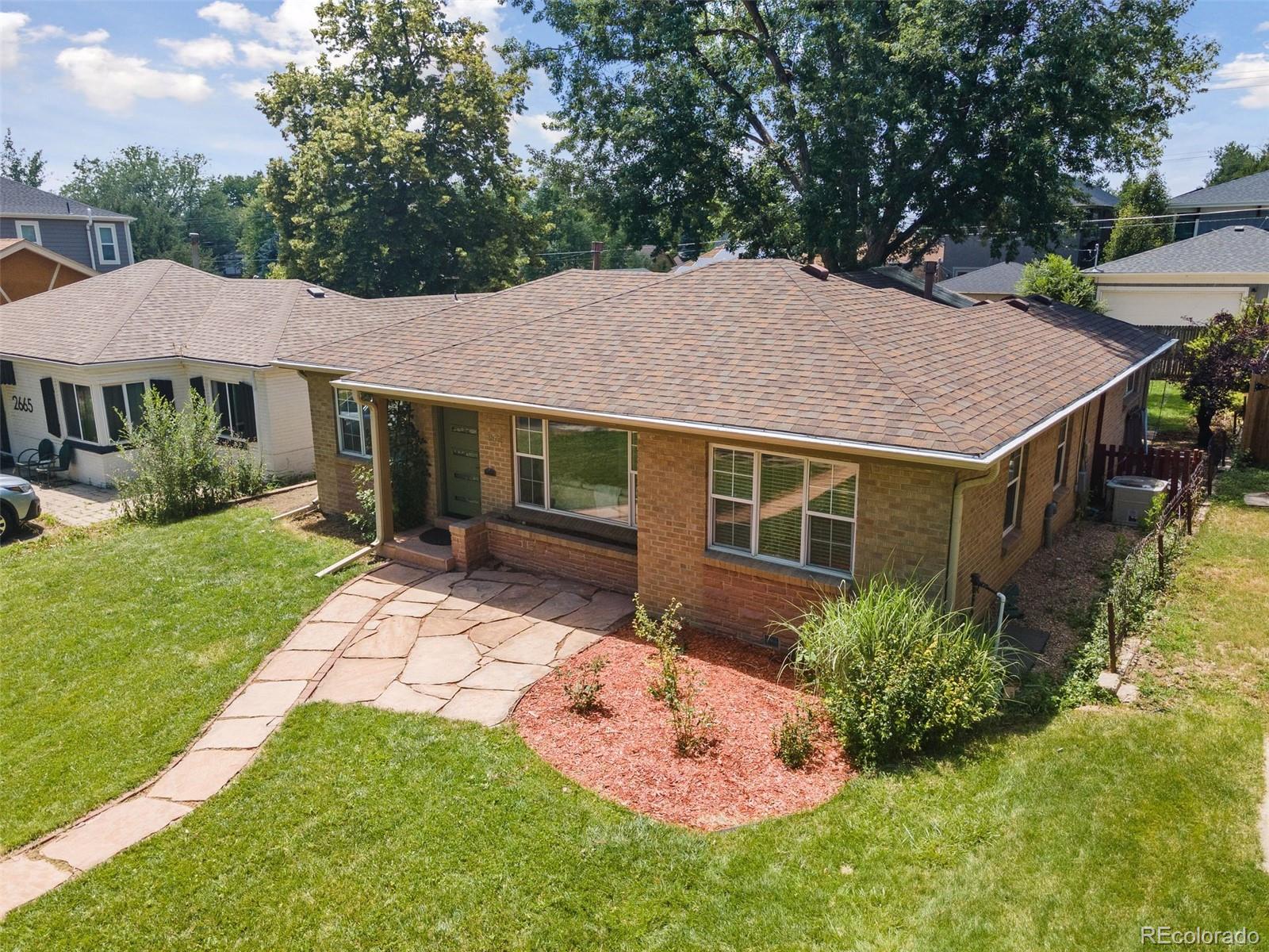 2675 Raleigh Street Denver, CO 80212 - Photo 29 of 33 a view of a house with a yard