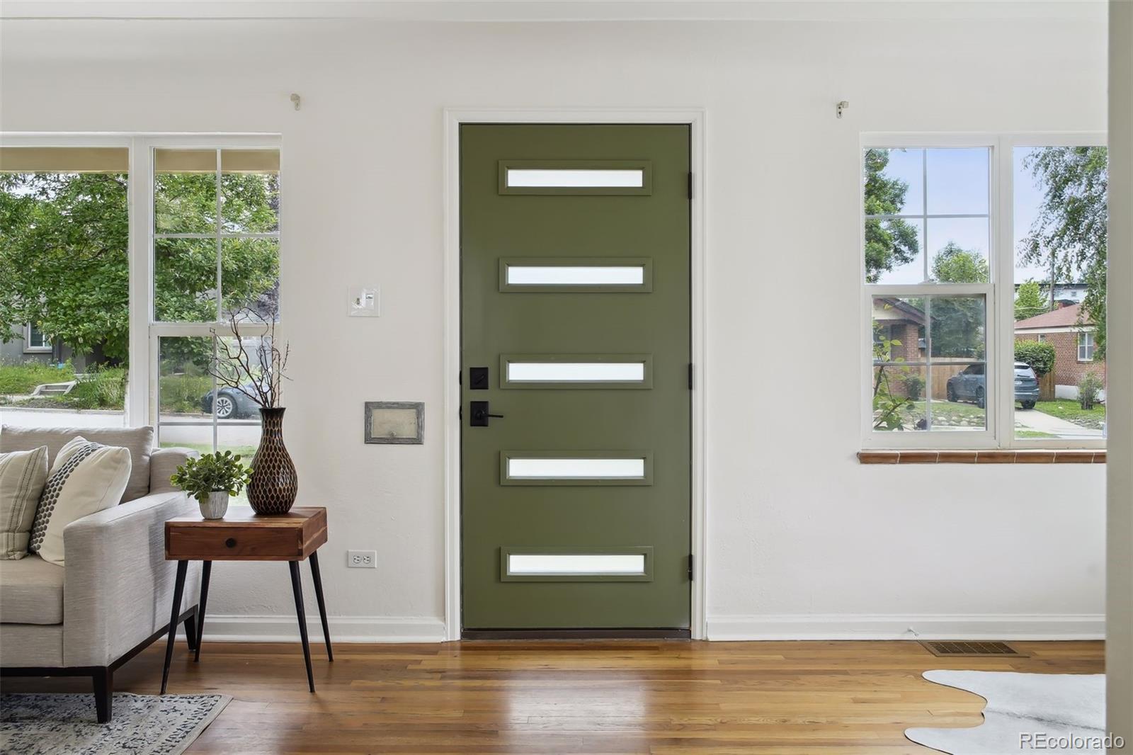 2675 Raleigh Street Denver, CO 80212 - Photo 4 of 33 a room with furniture and a window