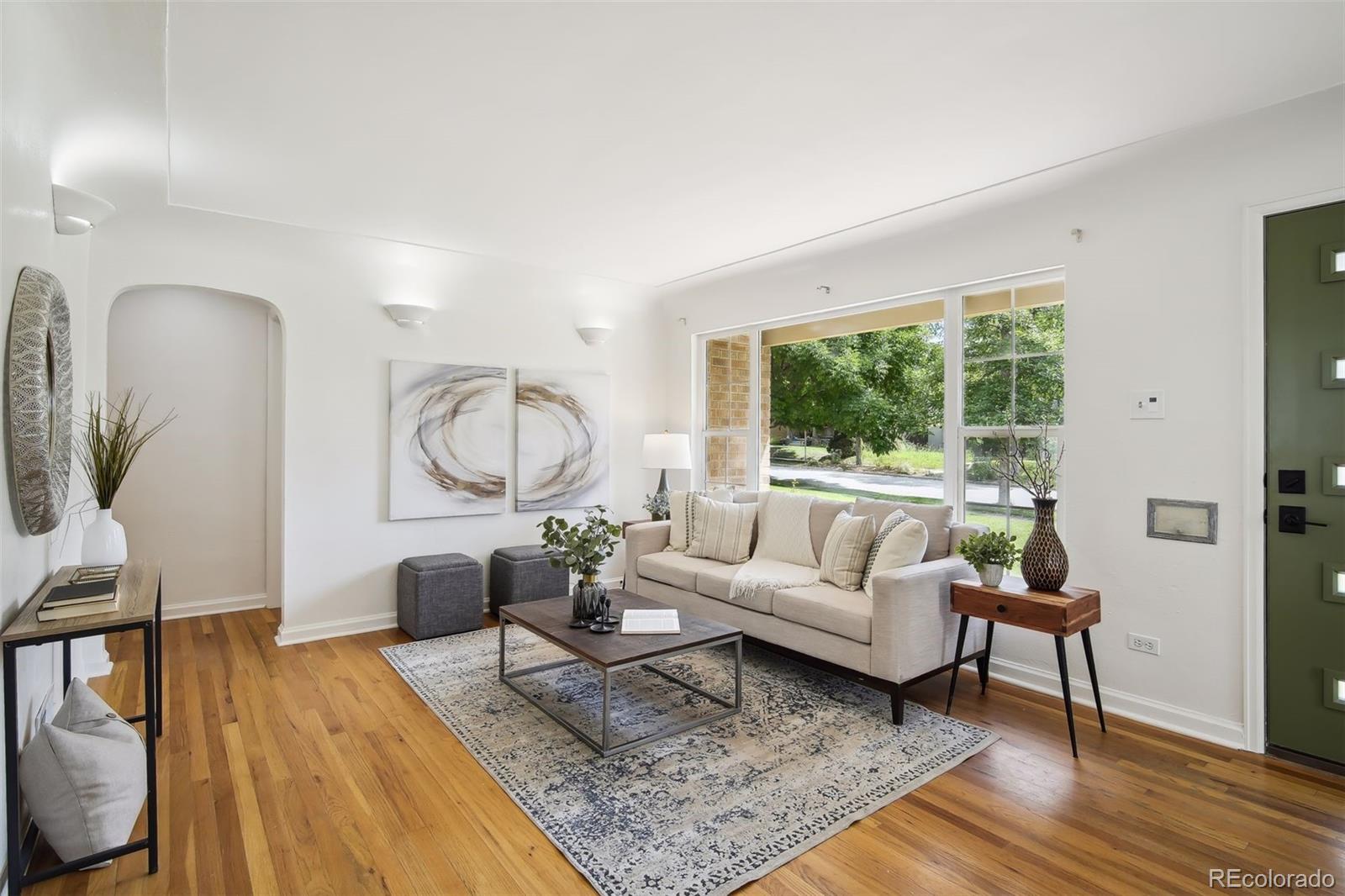 2675 Raleigh Street Denver, CO 80212 - Photo 5 of 33 a living room with furniture and a window