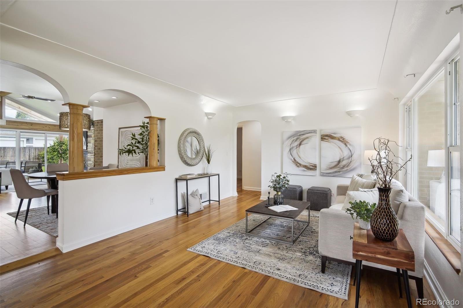 2675 Raleigh Street Denver, CO 80212 - Photo 6 of 33 a living room with furniture and a wooden floor