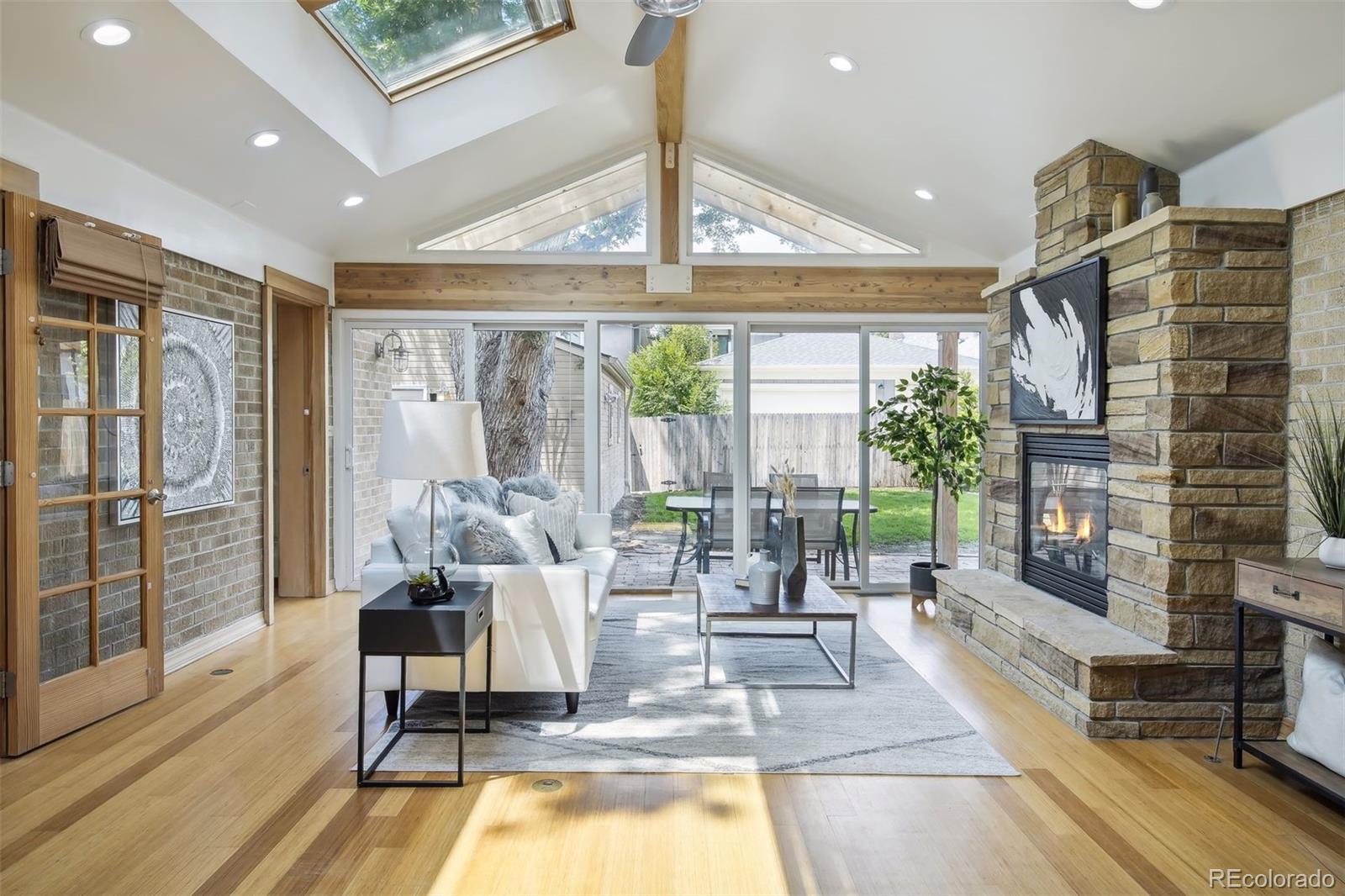 2675 Raleigh Street Denver, CO 80212 - Photo 8 of 33 a living room with furniture and a large window