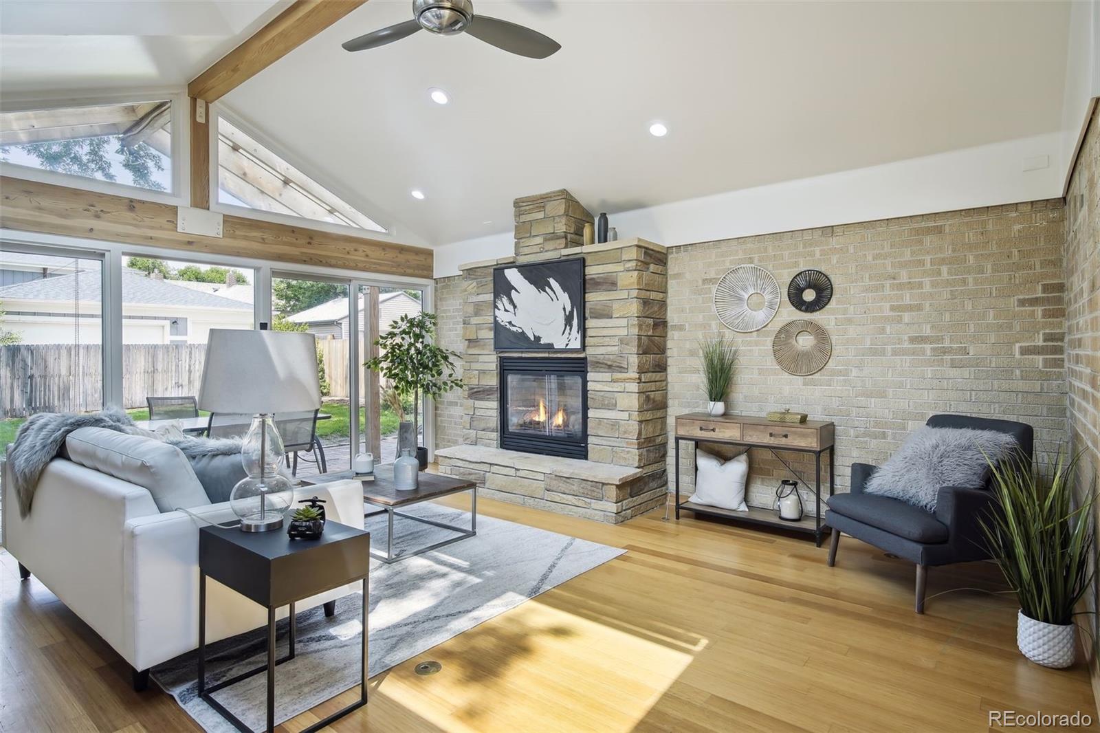 2675 Raleigh Street Denver, CO 80212 - Photo 10 of 33 a living room with furniture fireplace and window