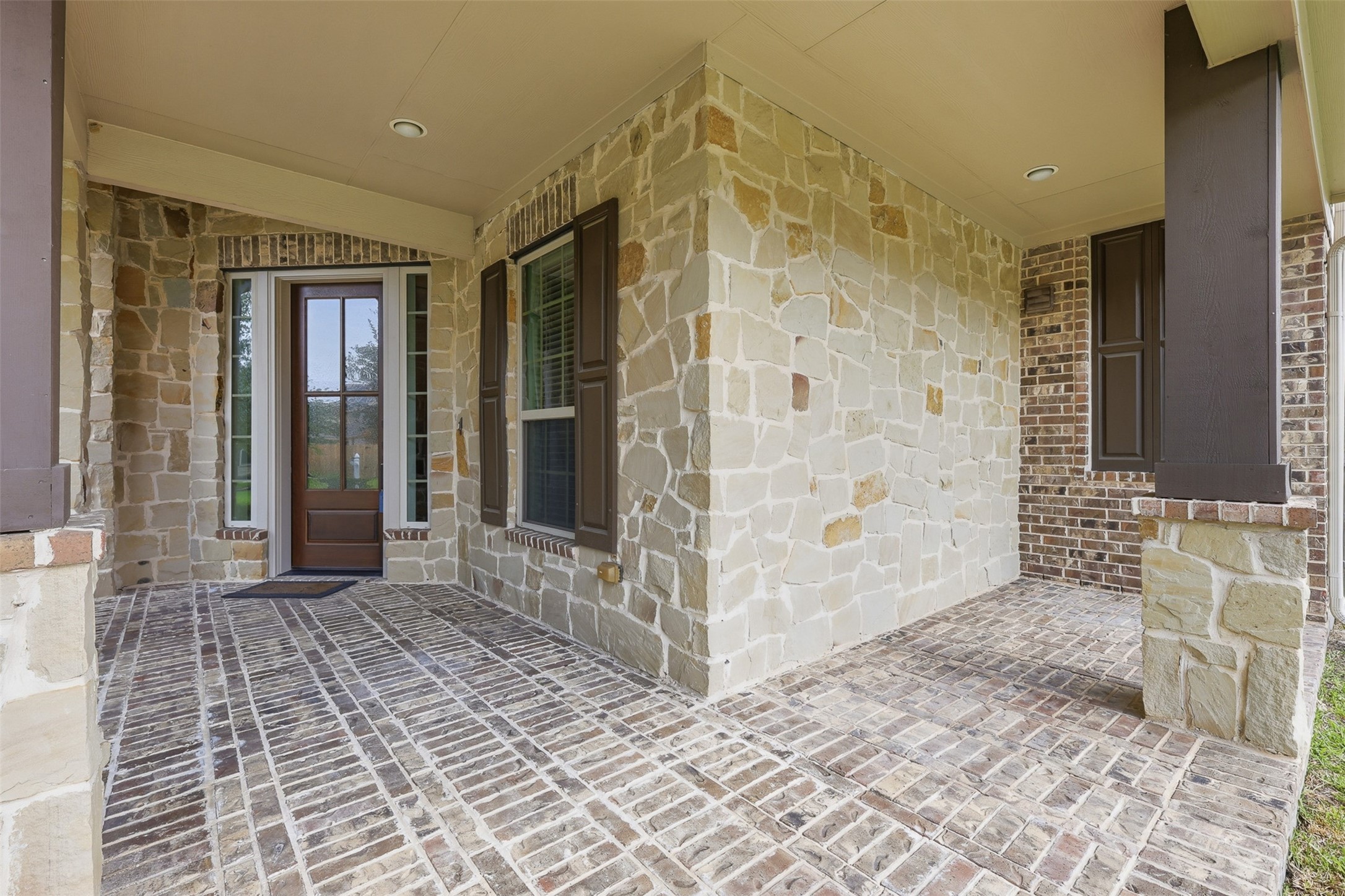 6835 Preston Grove Drive Spring, TX 77389 - Photo 4 of 49 a view of a entryway door with an outdoor space