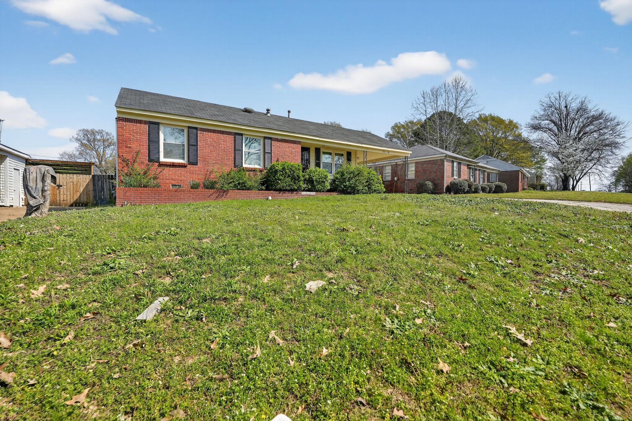 3220 Christine Road Memphis, TN 38118 - Photo 2 of 35 a front view of a house with garden
