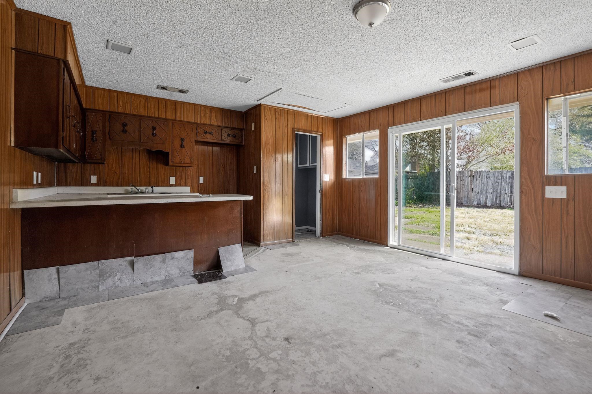 3220 Christine Road Memphis, TN 38118 - Photo 23 of 35 a view of a kitchen with furniture and a fireplace