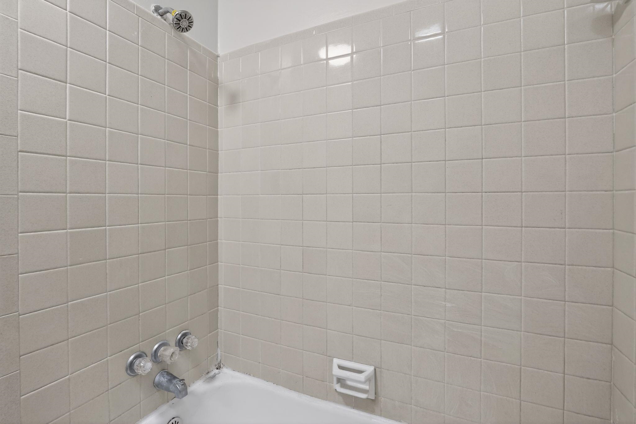 3220 Christine Road Memphis, TN 38118 - Photo 31 of 35 a bathroom with a sink and a shower