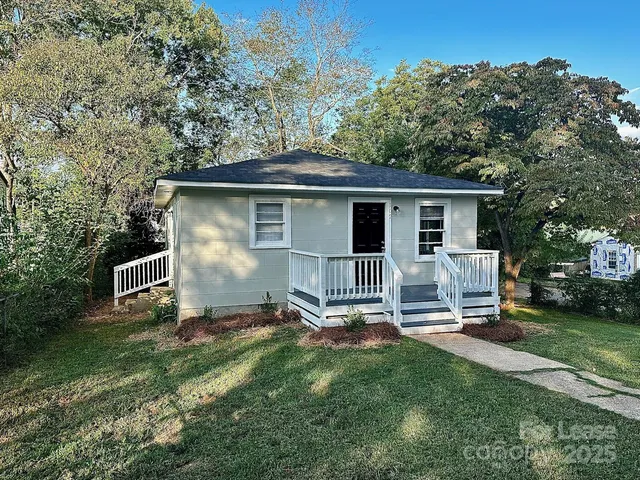 a house view with a garden space