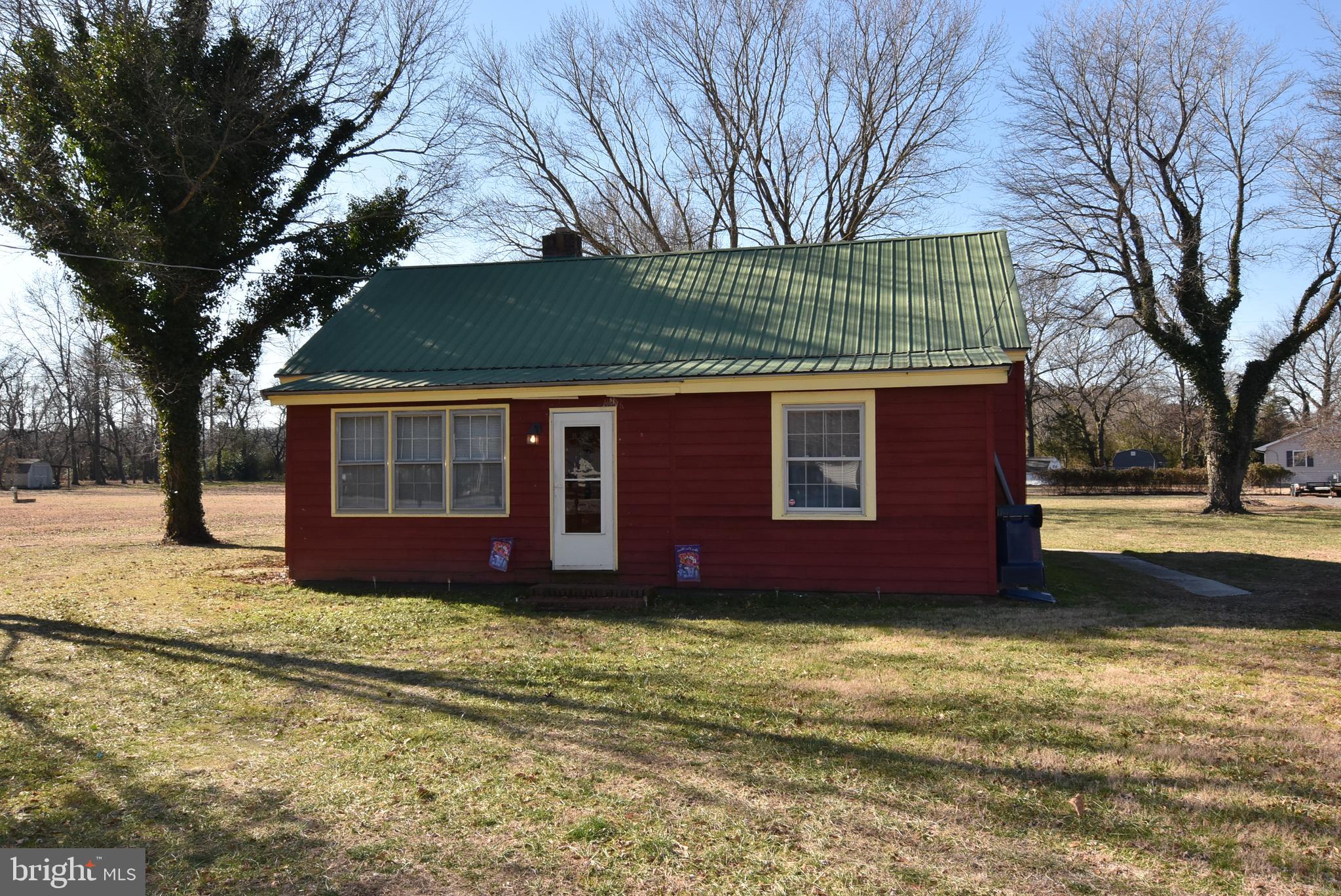 28740 Seaford Road Laurel, DE 19956 - Photo 14 of 44 a front view of a house with a yard
