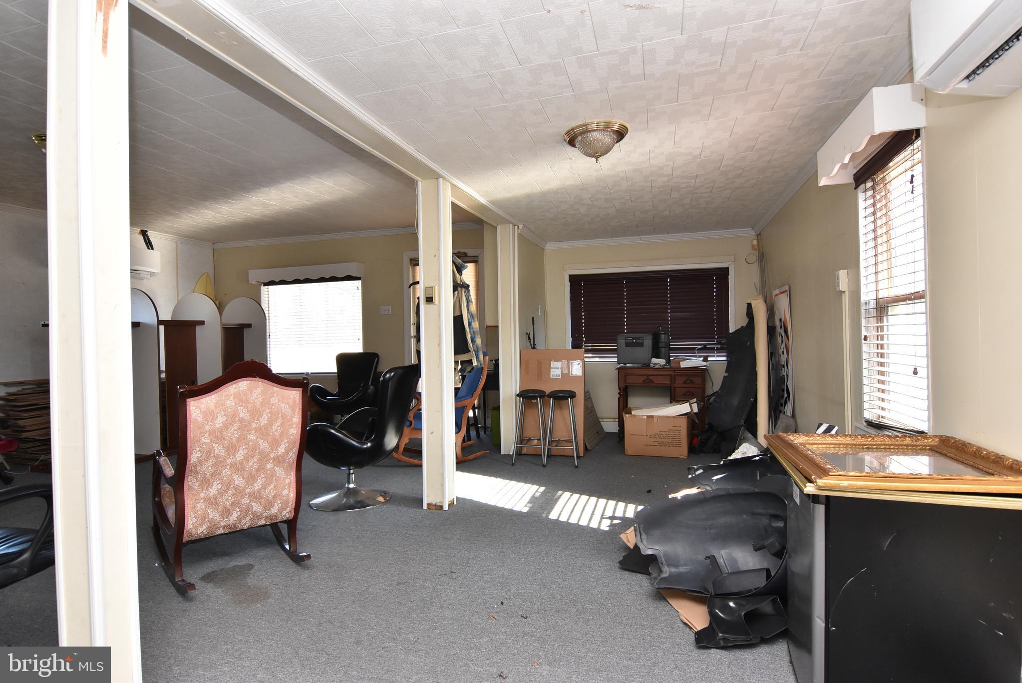 28740 Seaford Road Laurel, DE 19956 - Photo 22 of 44 a living room with furniture and a large window
