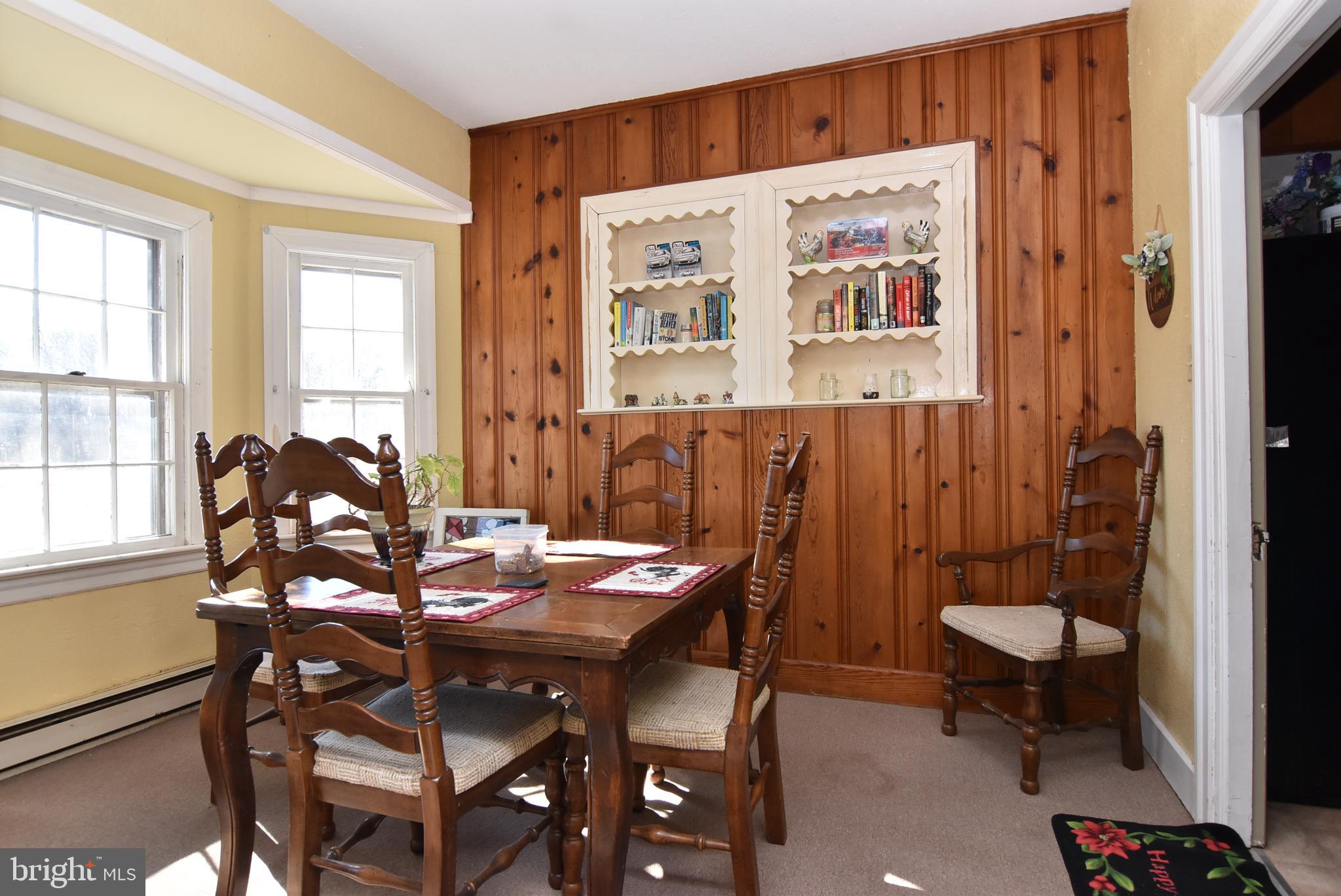 28740 Seaford Road Laurel, DE 19956 - Photo 25 of 44 a view of a dining room with furniture and window