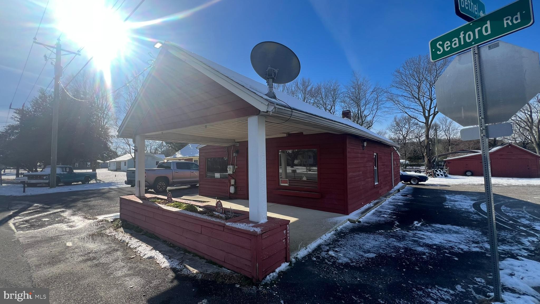 28740 Seaford Road Laurel, DE 19956 - Photo 6 of 44 a living room with couches and kitchen view
