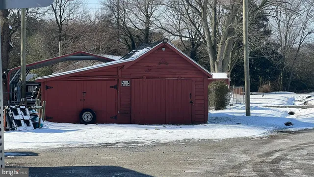 a house with trees in the background