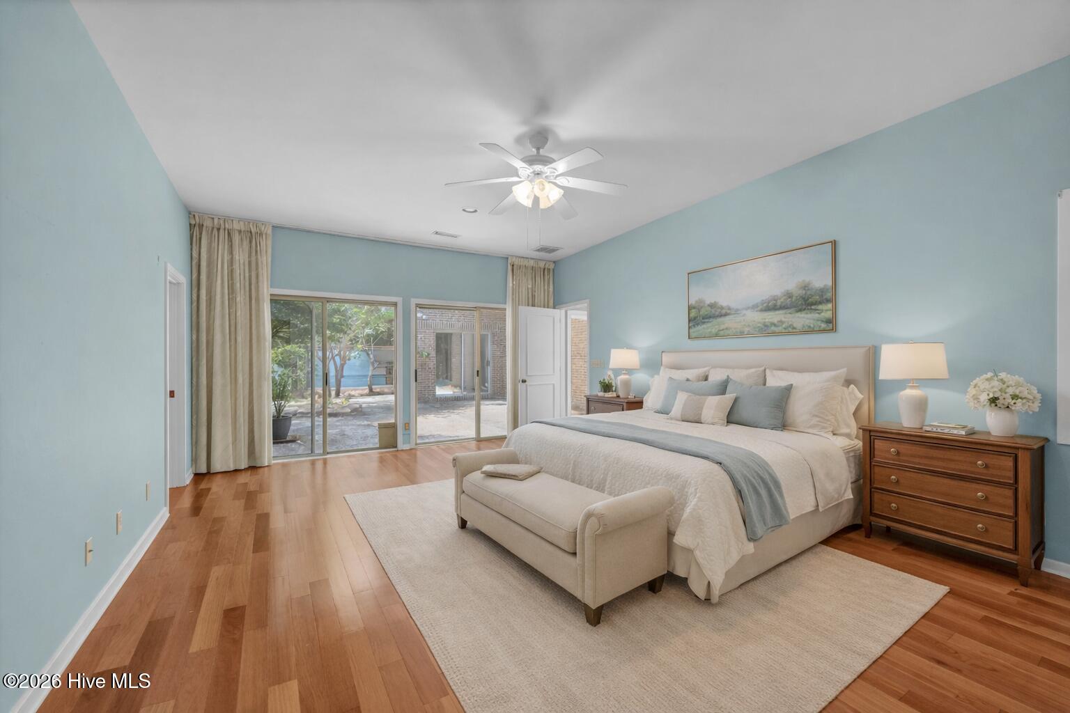 3701 Reston Court, Unit B Wilmington, NC 28403 - Photo 22 of 36 Serene master bedroom with garden view