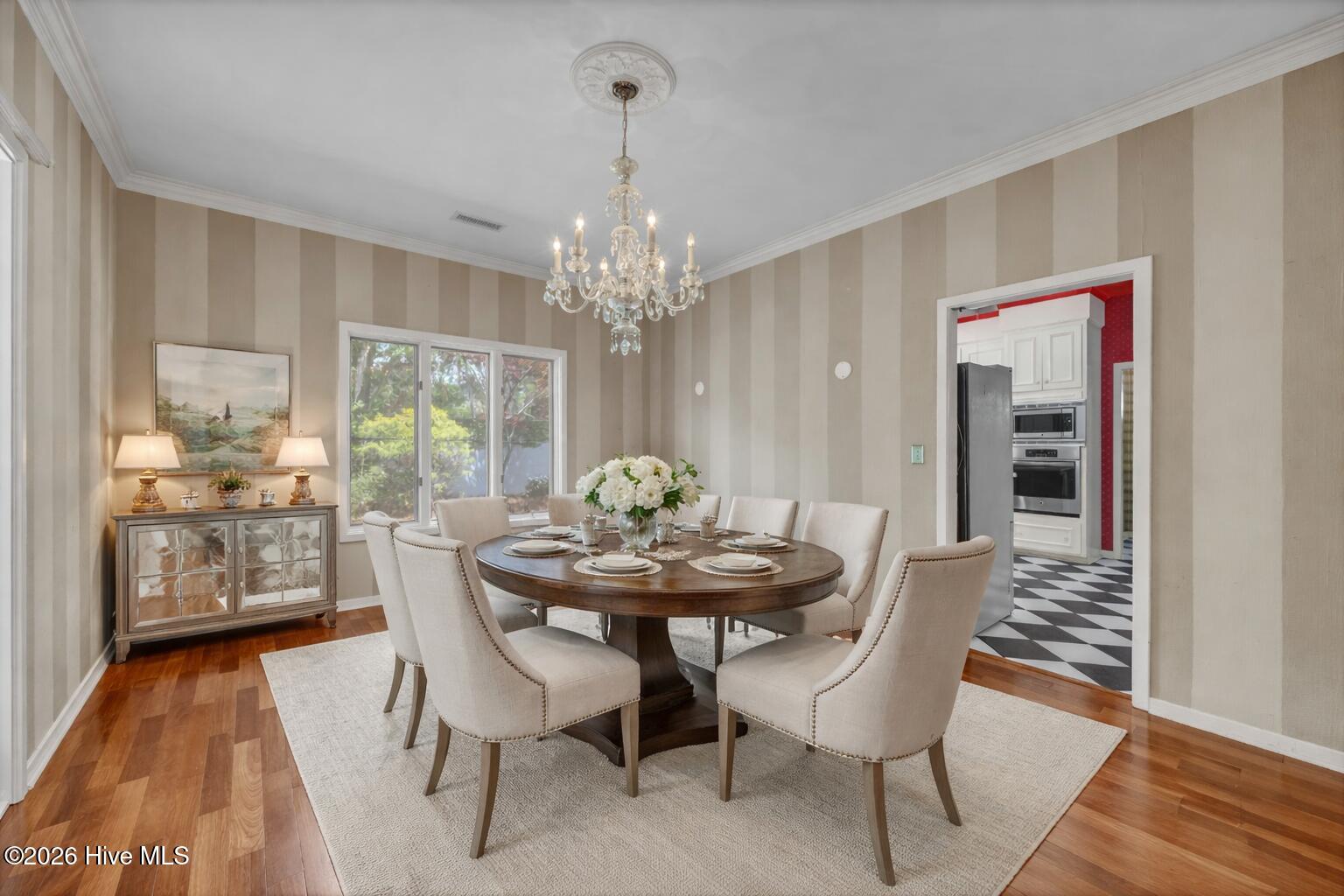 3701 Reston Court, Unit B Wilmington, NC 28403 - Photo 8 of 36 Elegant dining room with floral centerpi