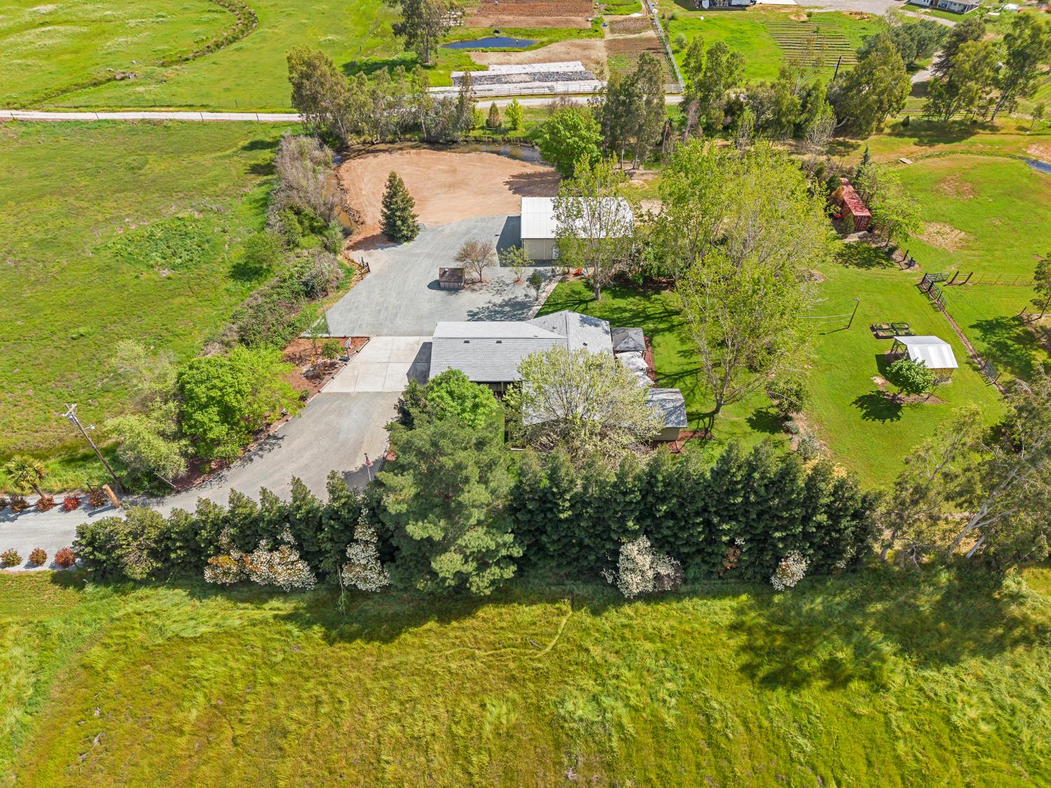 12354 Hobday Road Wilton, CA 95693 - Photo 27 of 77 aerial view of sparsely populated area with a pastoral area