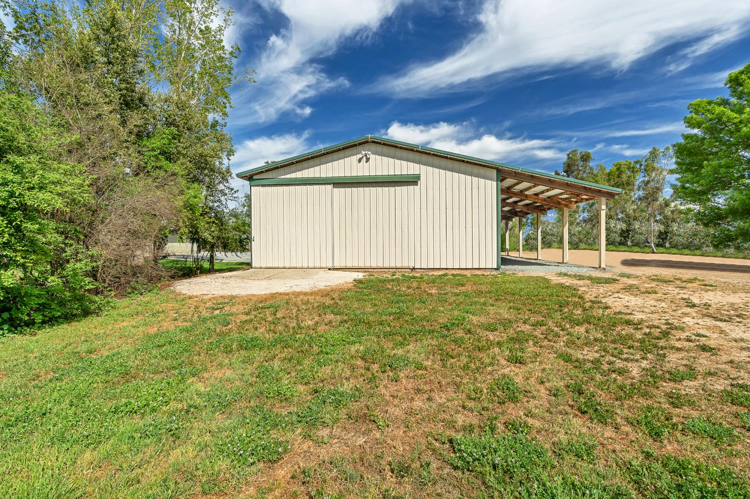 12354 Hobday Road Wilton, CA 95693 - Photo 34 of 77 view of pole building featuring a yard