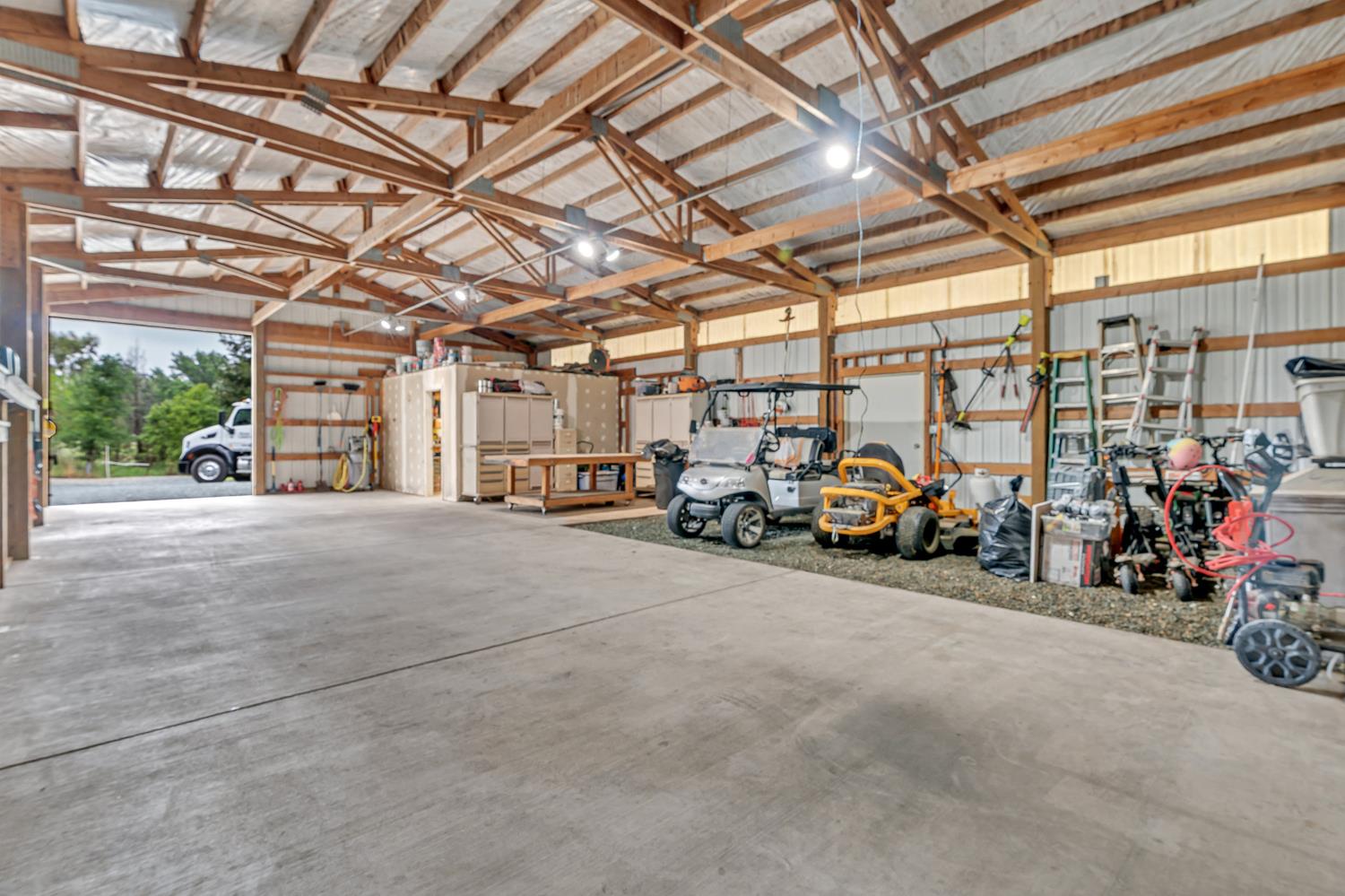 12354 Hobday Road Wilton, CA 95693 - Photo 37 of 77 garage featuring metal wall