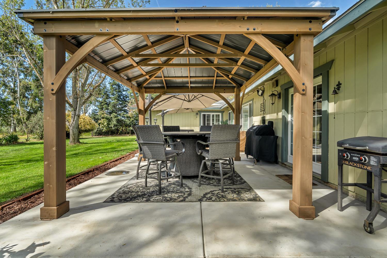 12354 Hobday Road Wilton, CA 95693 - Photo 6 of 77 view of patio / terrace featuring a gazebo and area for grilling