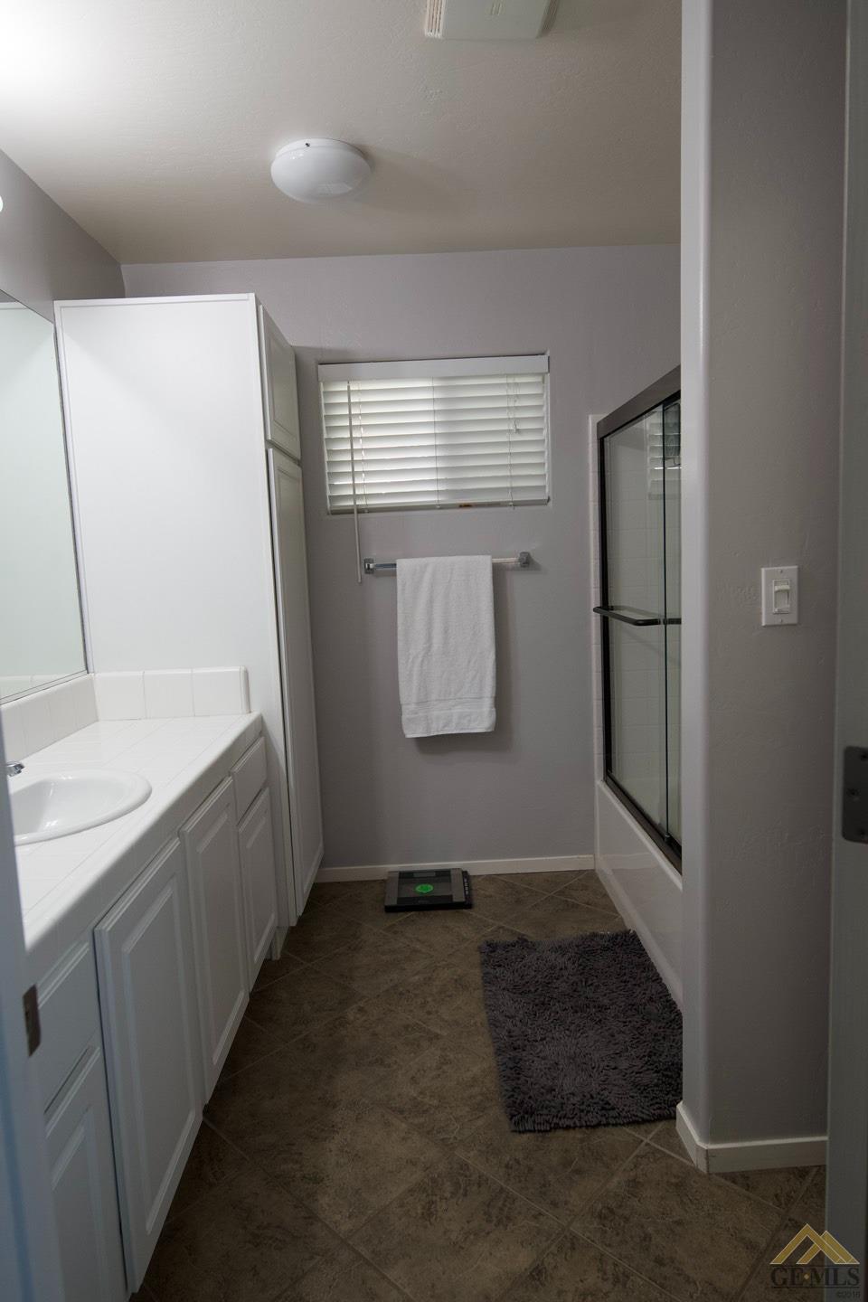 Undisclosed Address Bakersfield, CA 93312 - Photo 14 of 21 a room with window and entrance