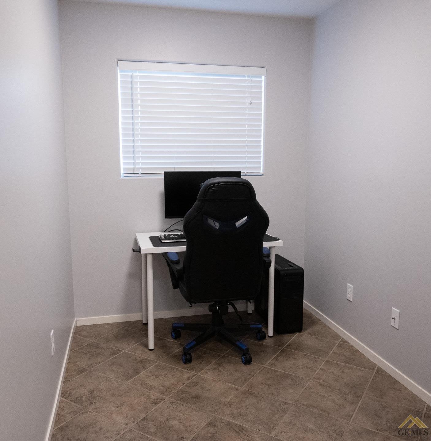 Undisclosed Address Bakersfield, CA 93312 - Photo 8 of 21 a view of workspace with a window