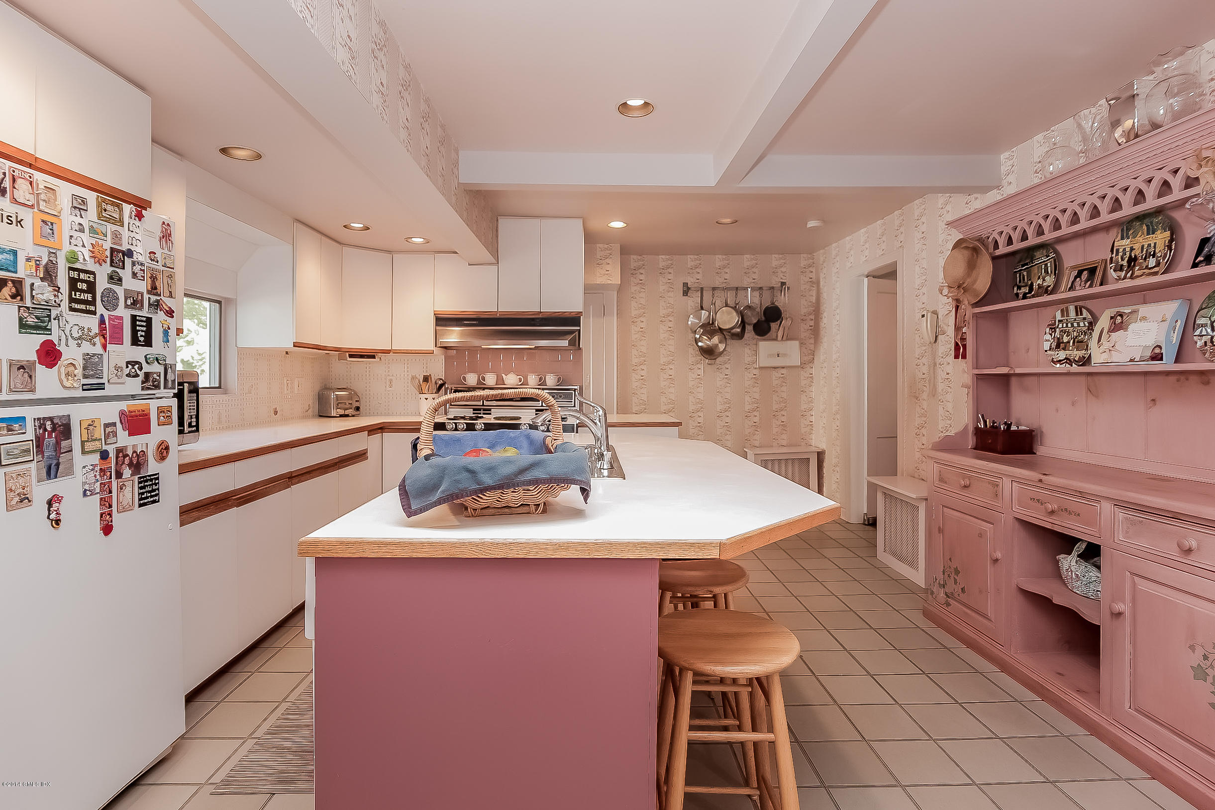 26 Meadow Road Riverside, CT 06878 - Photo 11 of 24 a kitchen with stainless steel appliances granite countertop a sink dishwasher and cabinets with wooden floor